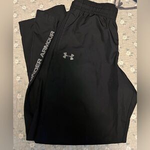 Under armour golf pants, partial zip leg.